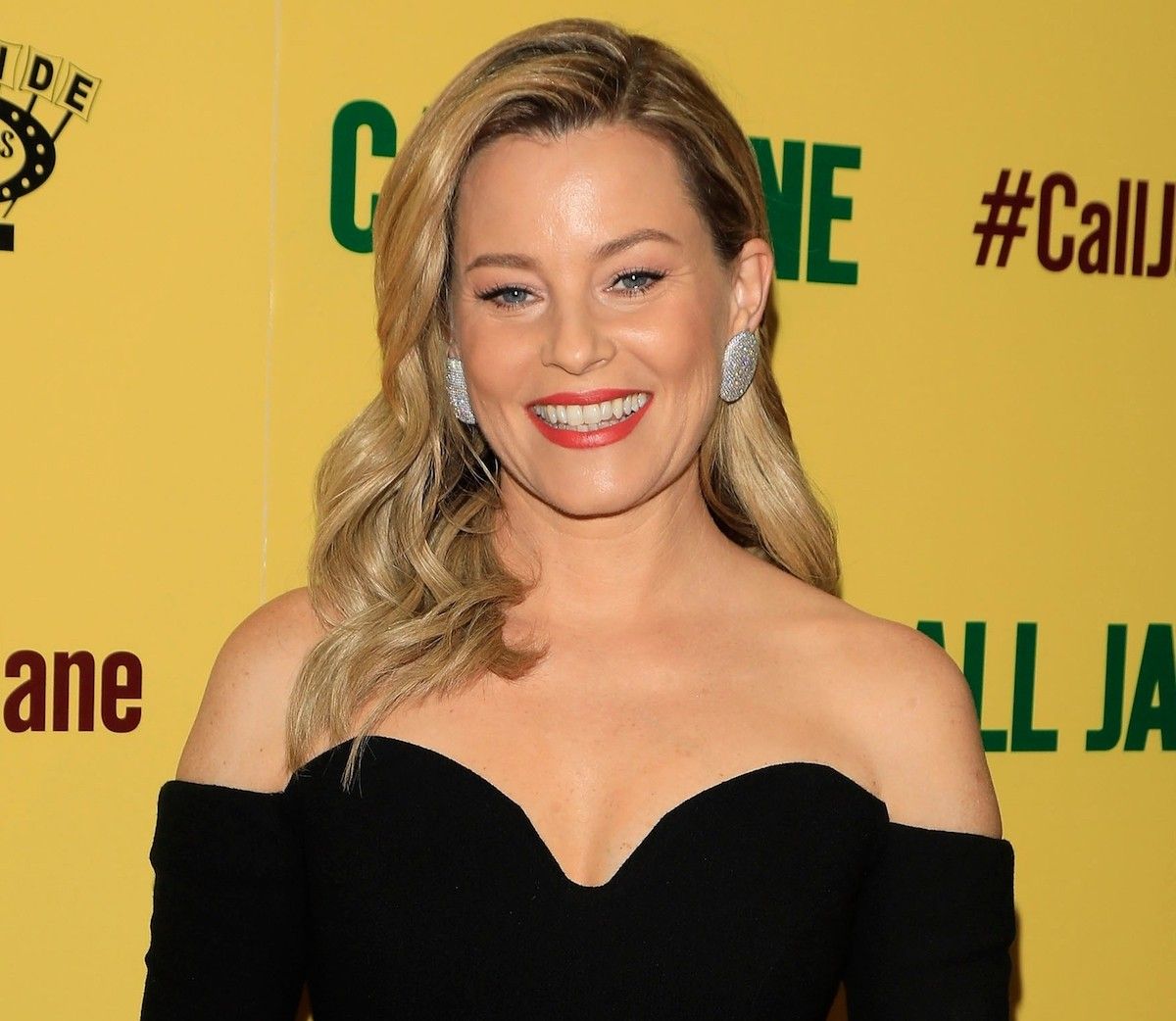 dee sprung add elizabeth banks in a bikini photo