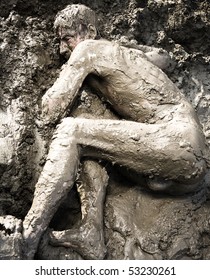 cua cardinal add men naked in mud photo