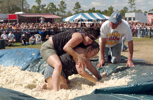 oiled mixed wrestling