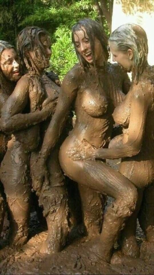 men naked in mud