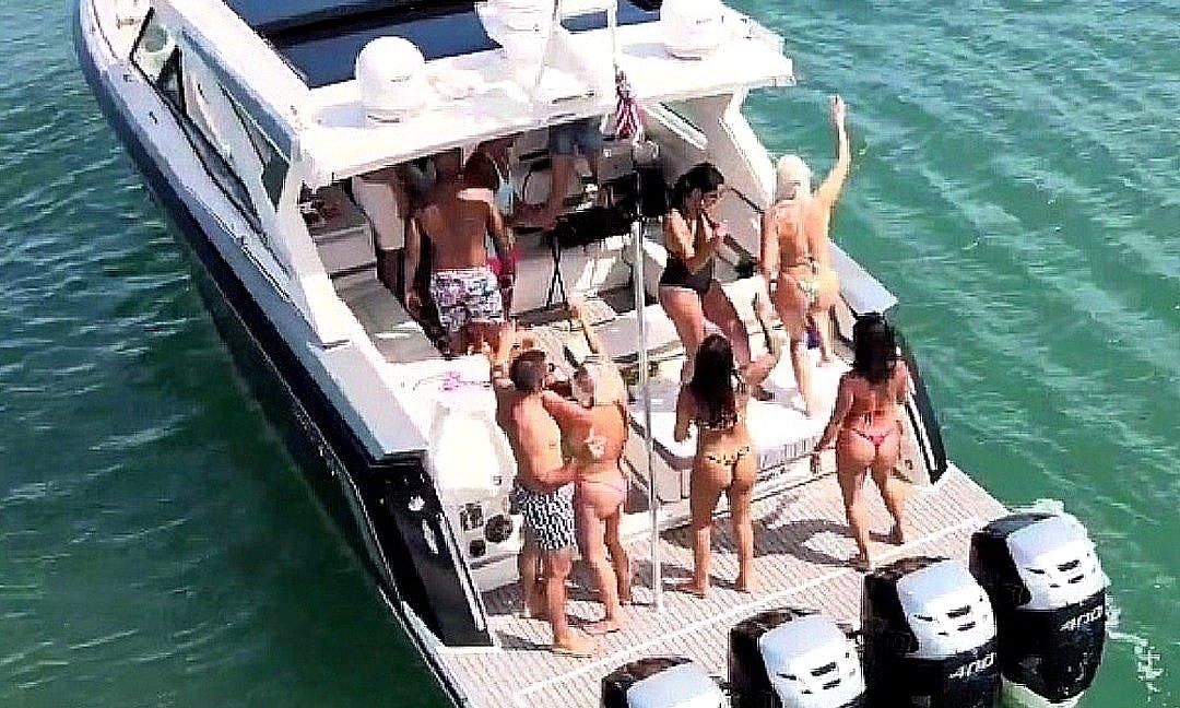 chrystal newman add photo topless boat party