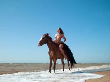 debra oshaughnessy add naked woman on horseback photo